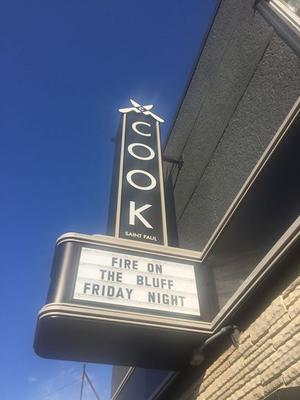 Cook St. Paul marquee heralds our upcoming night Photo of Cook St. Paul restaurant marquee reading Fire on the Bluff Friday Night.